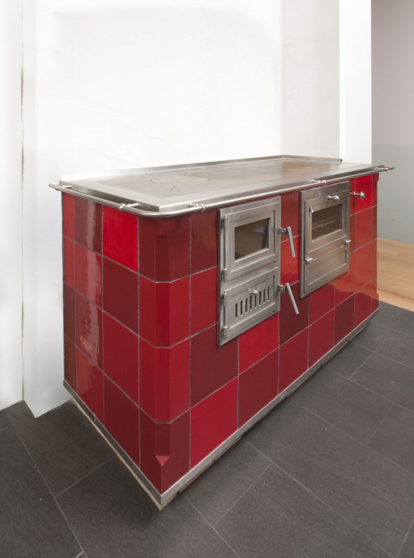 Red tile cookstove by Jessica Steinhauser